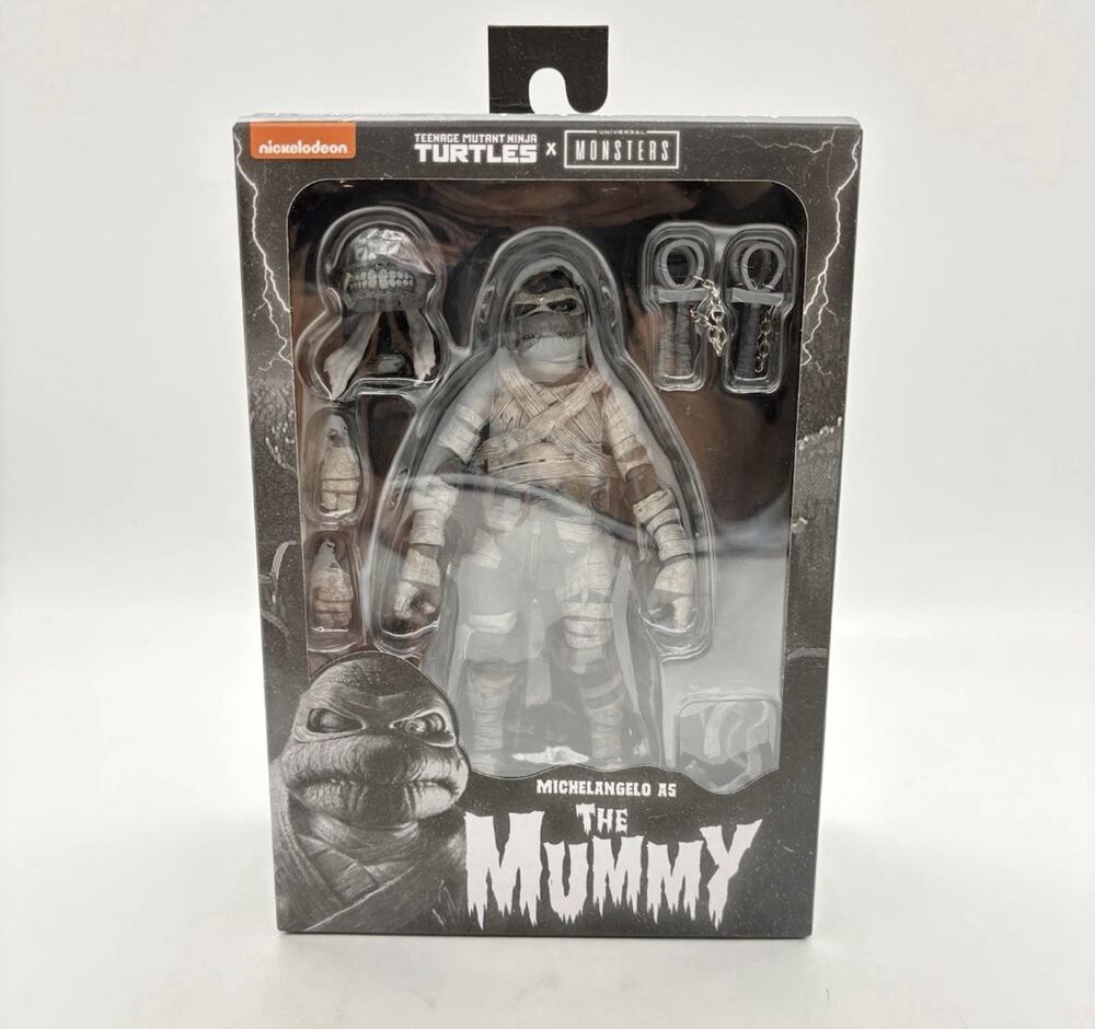 NECA TEENAGE MUTANT NINJA TURTLES X MONSTERS MICHELANGELO AS THE MUMMY NEW
